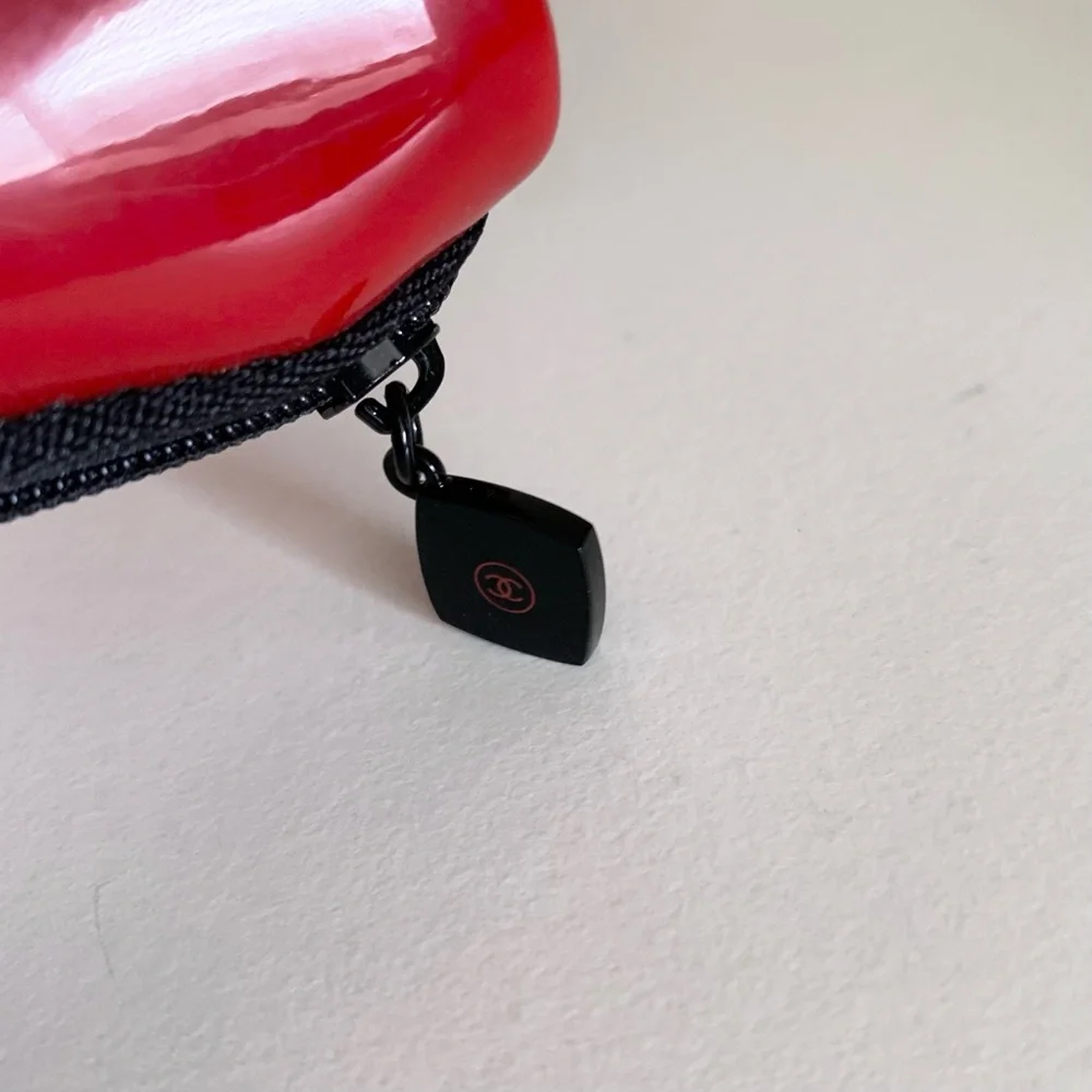 Hold Chanel Red zippy pouch